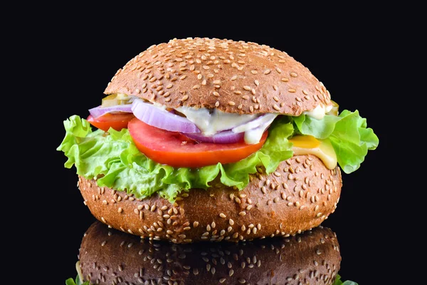 Fresh tasty burger on black background. Tasty and appetizing cheeseburger. Vegetarian burger — Stock Photo, Image