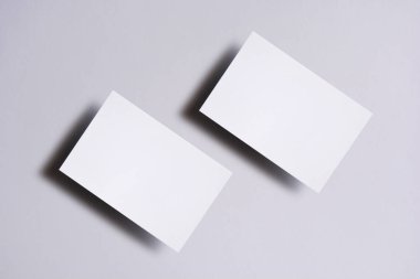 Beyaz boş beyaz iş kartlarına fotoğraf. Mock-up kimlik marka için. Grafik tasarımcıları sunumlar ve Portföyleri için