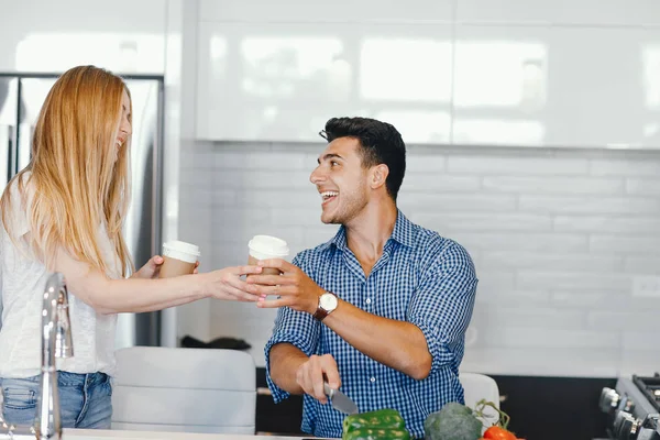 couple at home in a kitchen