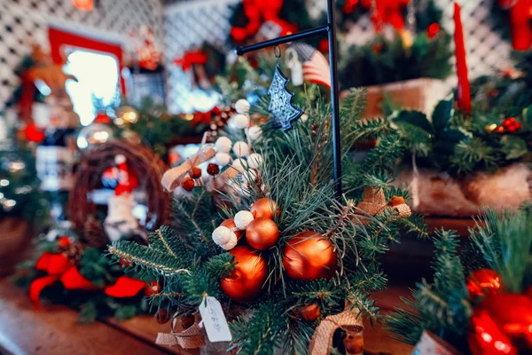 Closeup of red bauble hanging decorated Christmas tree — Stock Photo, Image