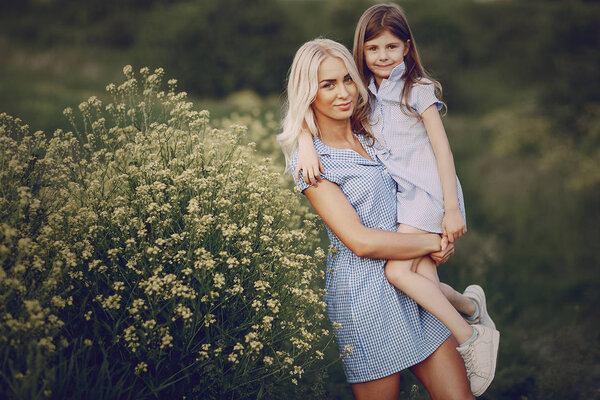 mom and daughter outside