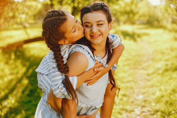 Beautiful mother with pretty daughter — Stock Photo, Image