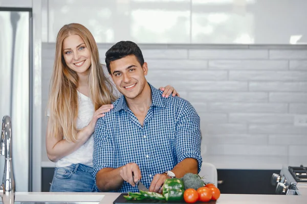 couple at home in a kitchen