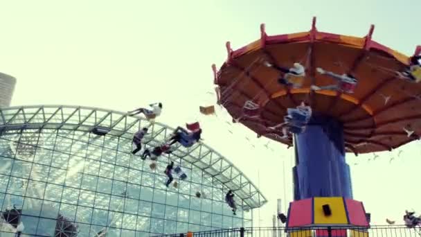 Navy Pier, Chicago Illinois, May 22, 2019: video of people riding a swing at a fair at Navy Pier in Chicago — Stock Video