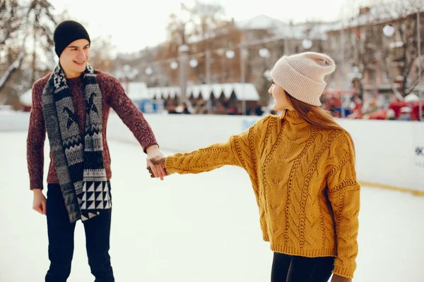 Cute couple in a ice arena — Stock Photo, Image