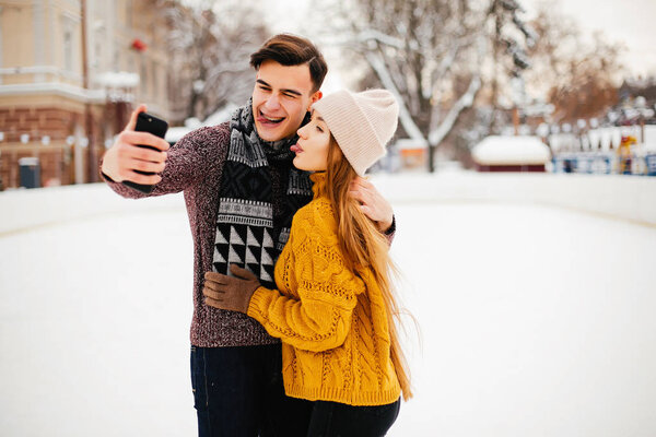 Cute couple in a winter city