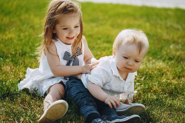 Children on a grass — Stock Photo, Image