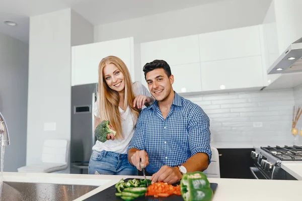 couple at home in a kitchen