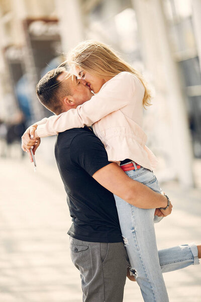 Beautiful couple standing in a airport