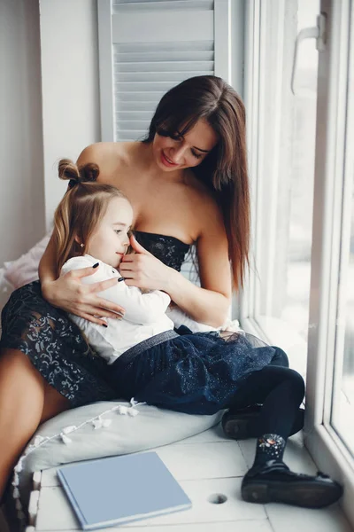 Mother with cute daughter at home — Stock Photo, Image