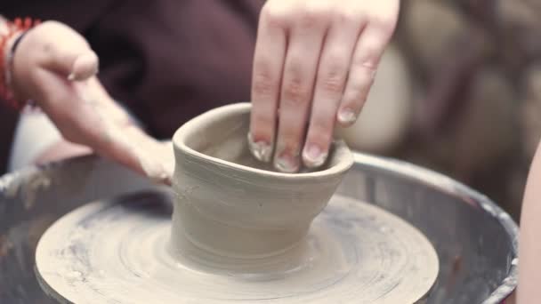 Close up hands make pitchers in pottery — Stock Video