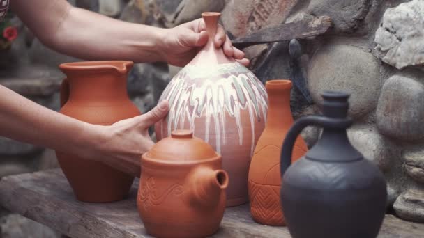 Young people make jug in pottery — Stock Video