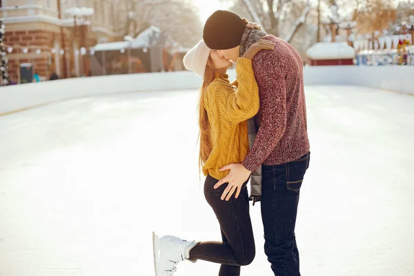 Cute couple in a ice arena — Stock Photo, Image