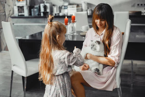 Mother with daughter at home — Stock Photo, Image