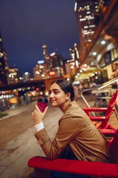 Woman drinking coffee at night — Stock Photo, Image