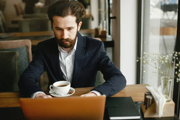Stylish businessman working in a office — Stock Photo, Image