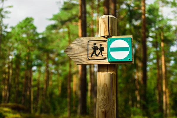 Wooden hiking trail sign
