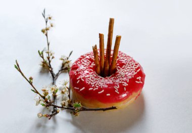 one donut on a light background
