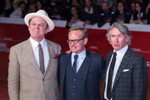 Rome, Italy. October 24, 2018: John C. Reilly, Steve Coogan and Jon Baird at the red carpet of the movie 'Stan & Ollie' at Rome Film Fest 2018.