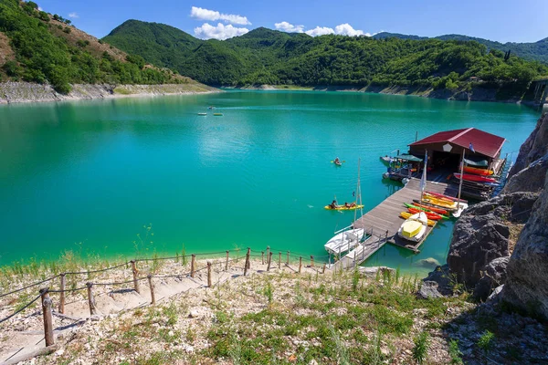 Boat and canoe rentals on Lake Turano, Italy.