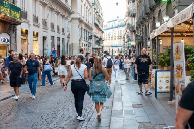 Naples, Italy - September 12, 2025: Citizens and tourists stroll along the central Via Toledo, an important landmark for visiting the city's historic center.