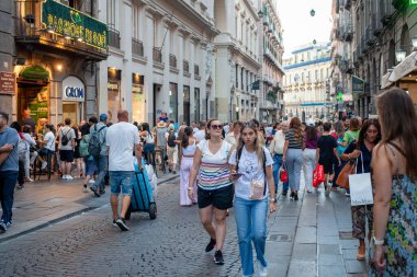 Naples, Italy - September 12, 2025: Citizens and tourists stroll along the central Via Toledo, an important landmark for visiting the city's historic center.