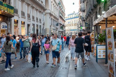 Naples, Italy - September 12, 2025: Citizens and tourists stroll along the central Via Toledo, an important landmark for visiting the city's historic center.