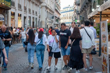 Naples, Italy - September 12, 2025: Citizens and tourists stroll along the central Via Toledo, an important landmark for visiting the city's historic center.