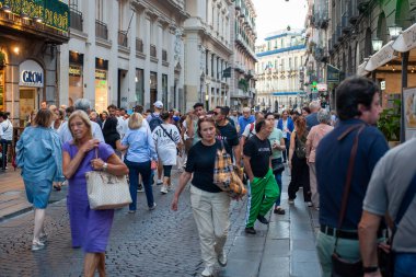 Naples, Italy - September 12, 2025: Citizens and tourists stroll along the central Via Toledo, an important landmark for visiting the city's historic center.