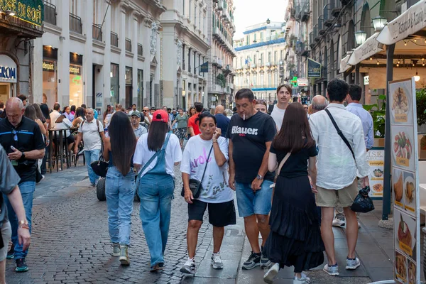Naples, Italy - September 12, 2025: Citizens and tourists stroll along the central Via Toledo, an important landmark for visiting the city's historic center.
