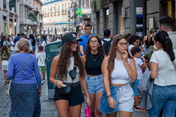 Naples, Italy - September 12, 2025: Citizens and tourists stroll along the central Via Toledo, an important landmark for visiting the city's historic center.