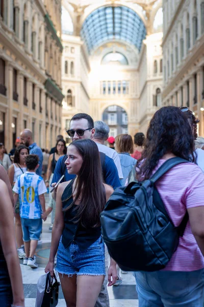 Naples, Italy - September 12, 2025: People stroll inside the majestic Galleria Umberto I, a historic monument.