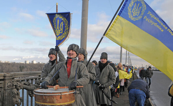 Drummers on the Paton Bridge for a rally with a live chain connecting the banks of the Dnieper on Unity Day in Kiev 01/22/2017