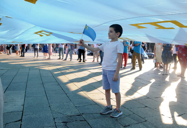 Solemn procession to the Day of the Crimean Tatar flag, in Kiev, June 26, 2020