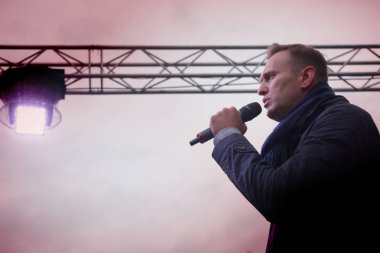 Novosibirsk, Russia-October 3, 2017.Politician Alexei Navalny speaks at an opposition rally clipart