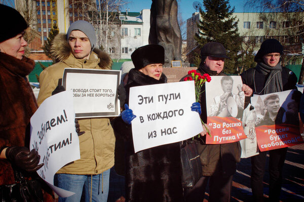 Barnaul, Russia-February 24, 2019.Picket on the anniversary of the death of Boris Nemtsov. People with posters "Russia without Putin" and " Russia will be free"