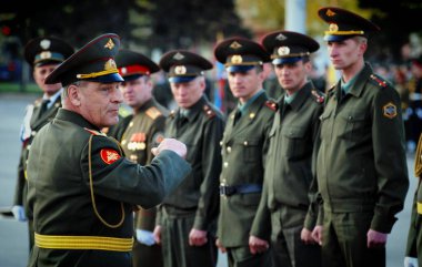 Barnaul,Russia - may 7, 2015.the Russian General shouts at the soldiers clipart