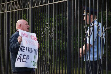 Barnaul,Russia-July 9, 2019. A man with a poster in support of correspondent Ivan Golunov and honest journalists detained by police clipart