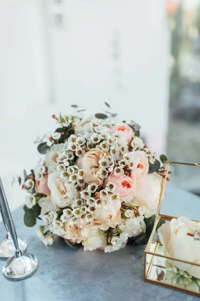 romantic flowers bouquet standing on the table