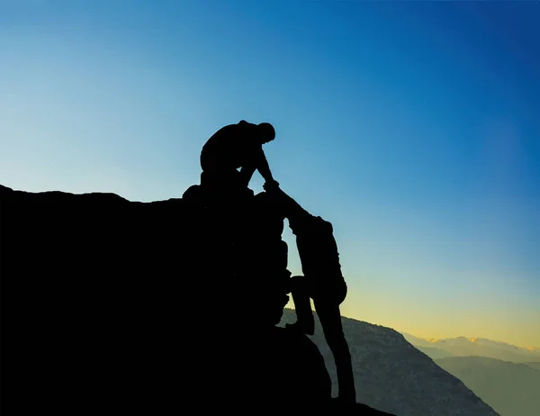 Silhouette Helping Hand Two Climber Royalty Free Stock Images