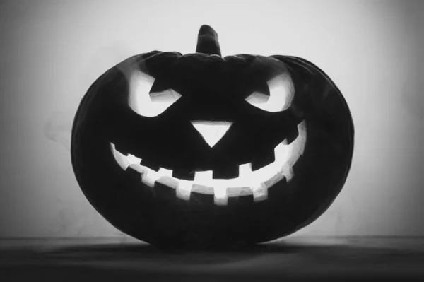 Happy Halloween. Creepy pumpkin Jack-o-lantern in smoke. — Stock Photo, Image
