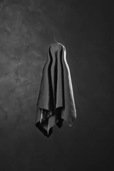 Flying Halloween Ghost. Scary black ghost on dark background. — Stock Photo, Image