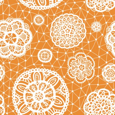 Turuncu arka planda çiçekler ve daireler olan kusursuz dantel desenler.