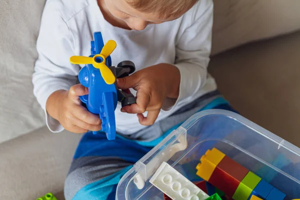 Child Playing Toy Blocks Sitting Sofa — Stock Photo, Image