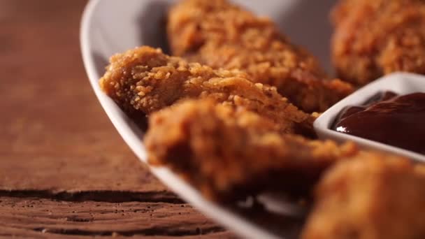 Hand Put Crispy Fried Chicken Legs Barbecue Sauce Eat — Stock Video