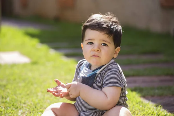 Beautiful Brazilian Baby Boy Grass Looking Camera Serious Baby — Stock Photo, Image