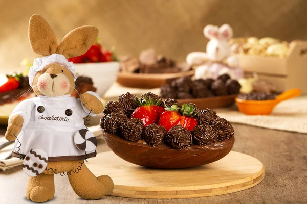 Gourmet easter egg, stuffed with chocolate and strawberry. Easter egg with pudding cream, Easter dessert. Easter concept