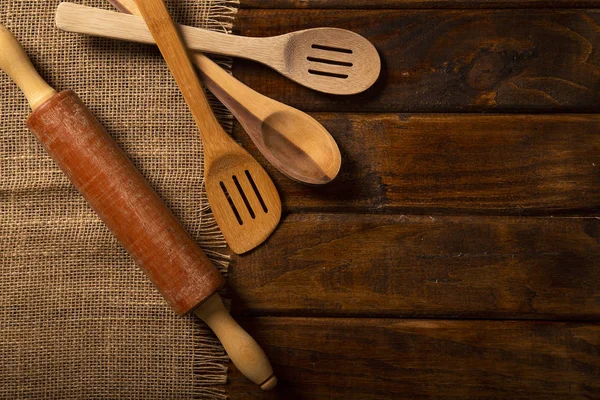 Wood spoons on wooden table. Top view — Stock Photo, Image