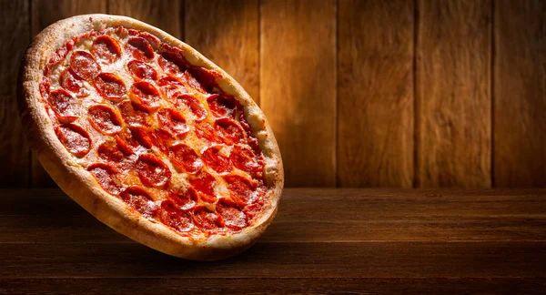 delicious taste pepperoni pizza, mozzarella cheese and copy space for your text.