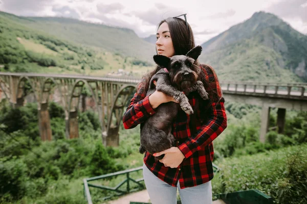 woman travel with dog